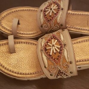 J. Vincent ladies 8m slides with embellished details.